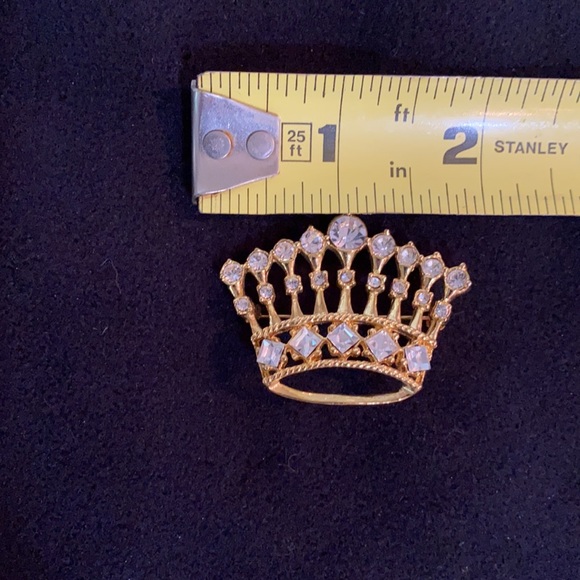 Costume gold colored crown w/ rhinestones pin. Good condition. - Picture 3 of 3